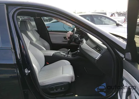 2016 BMW M5 z USA, uszkodzony, nr VIN WBSFV9C59GG343648